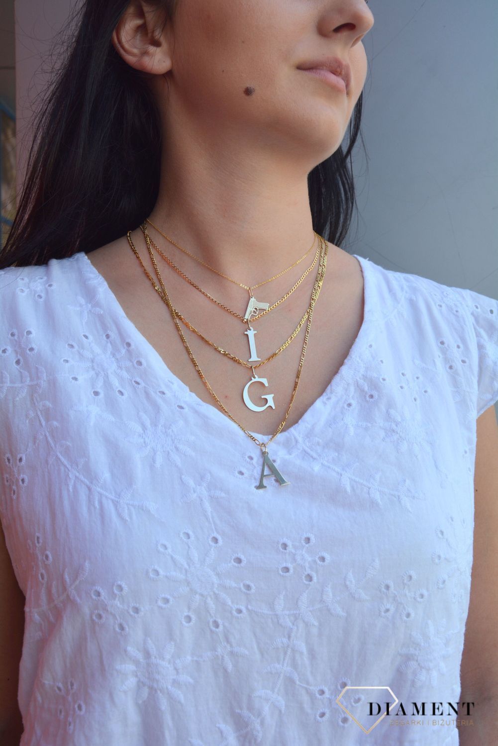 Złota zawieszka w kształcie litery I..jpg